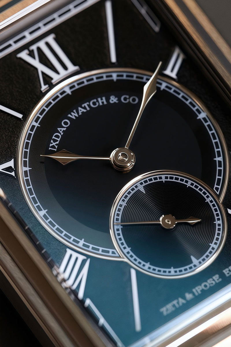 Close-up of a luxury watch dial with a dark blue gradient face, Roman numeral hour markers, gold-tone hands and bezel details, and a smaller subdial. Visible text includes 'IXDAO WATCH & CO' and 'ZETA & IPOSE EDITION'.